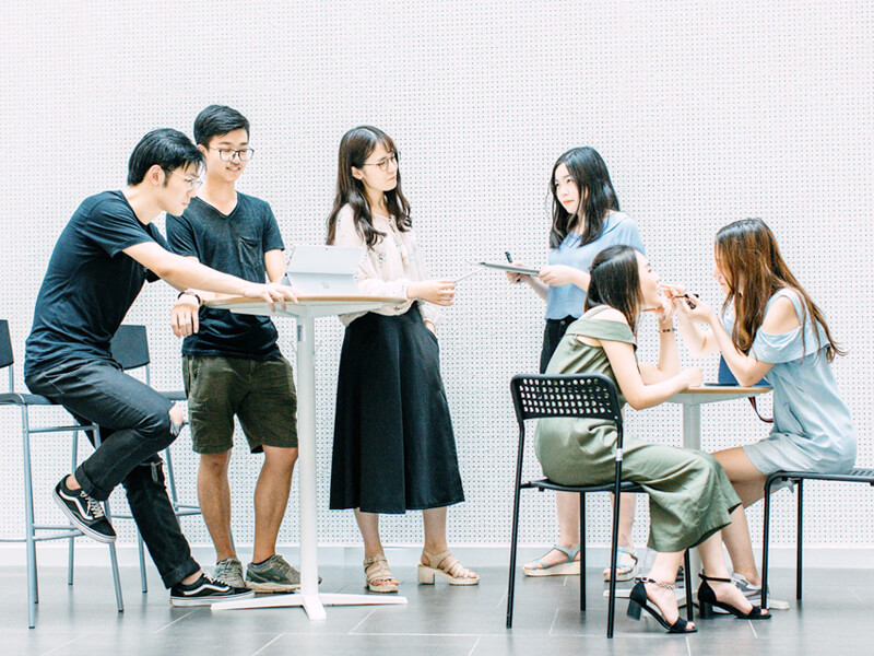 Codebyte team collaborating around a table